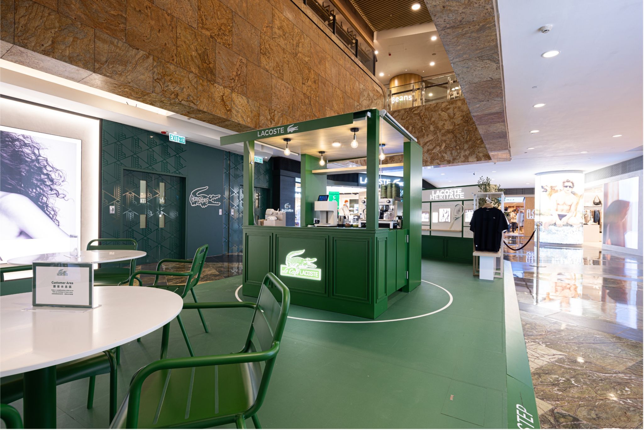 The original Lacoste café pop up with terrace seating, coffee kiosk and heritage display