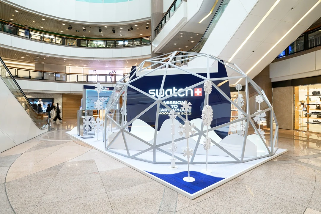 New mesh structure surrounding the reused Swatch cable car at Harbour City